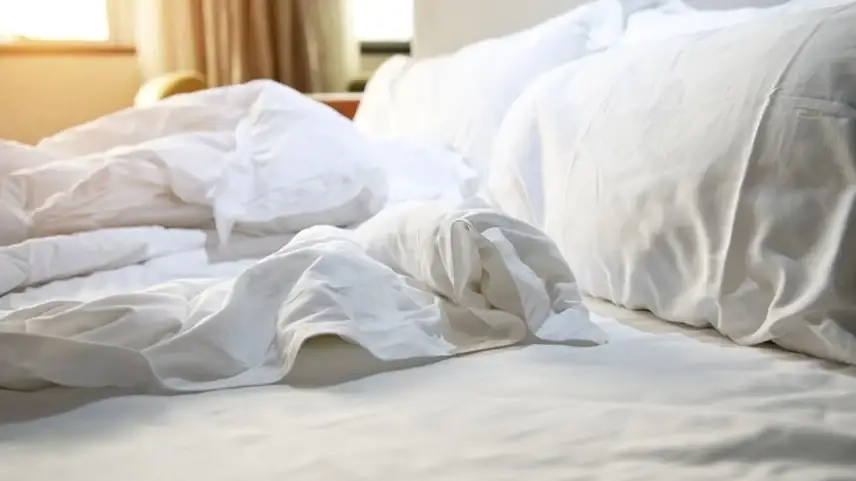 Person making a bed