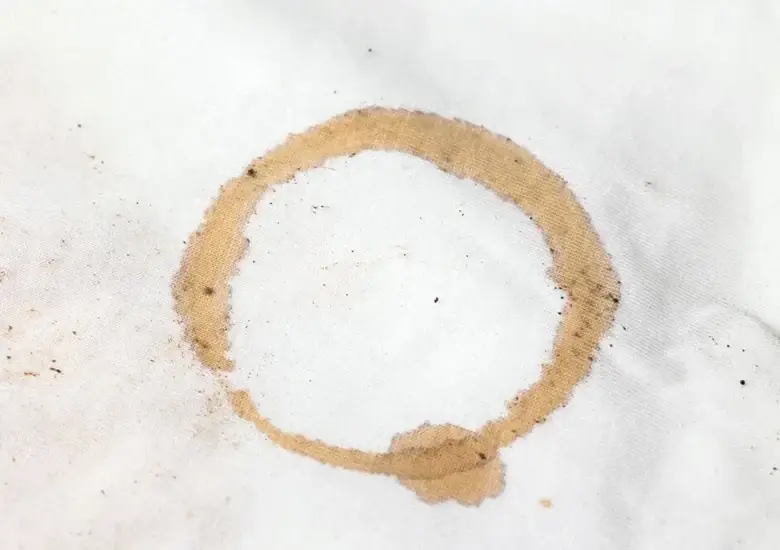 Coffee stain on white fabric